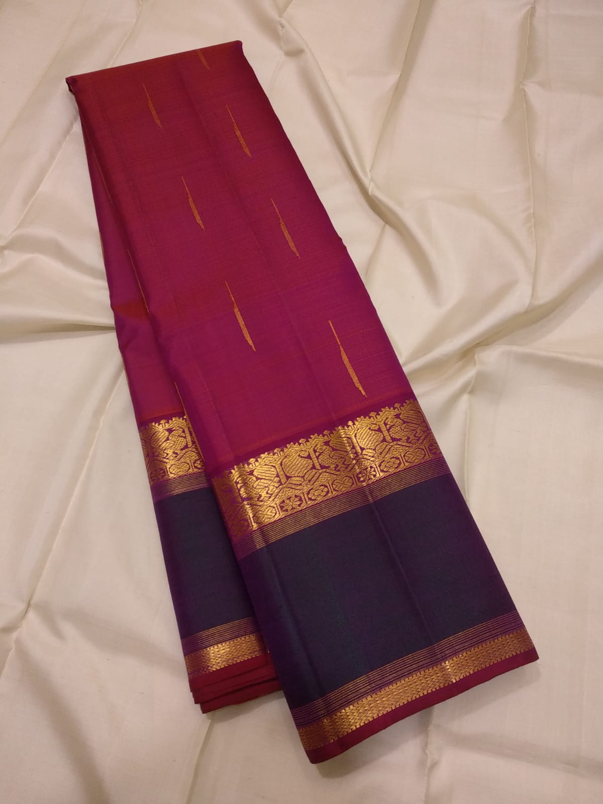 Handloom Kanchipuram Silk Saree with a Korvai border.